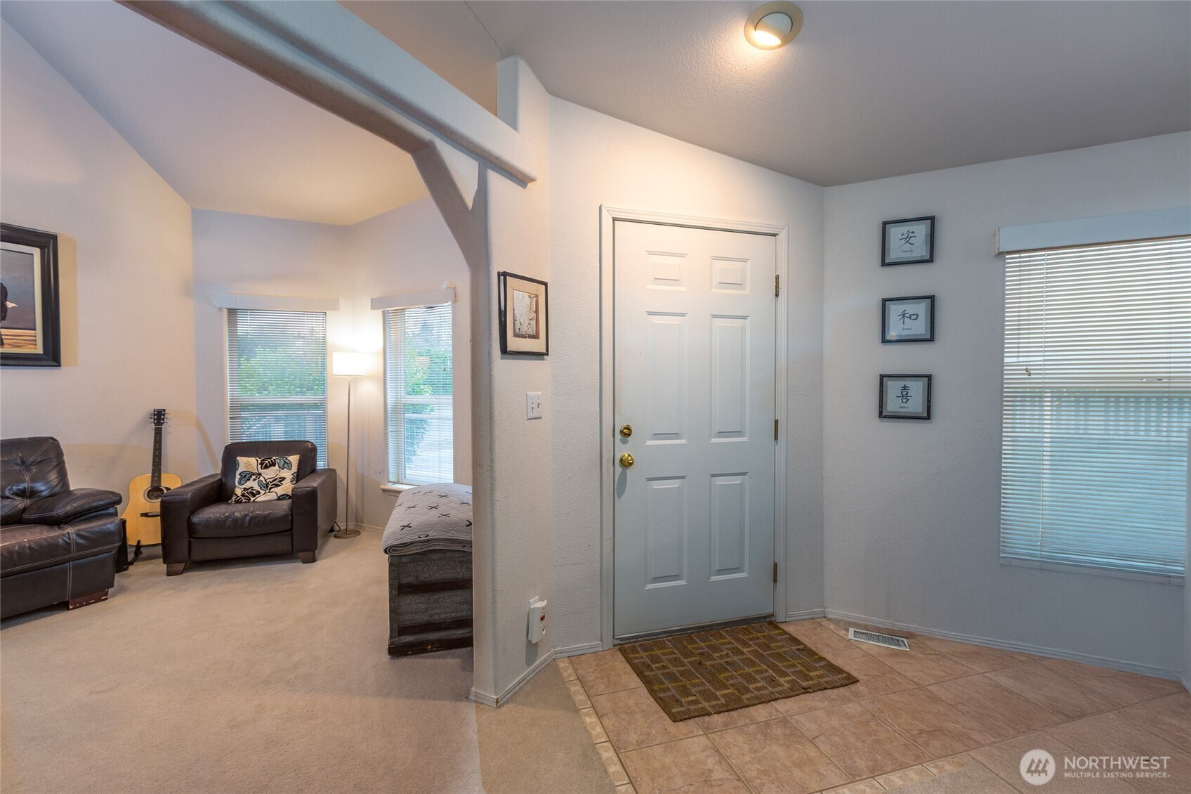 1785 Douglas Road, Unit 30 Friday Harbor, WA 98250 - Photo 22 of 32 a bedroom with furniture and a window