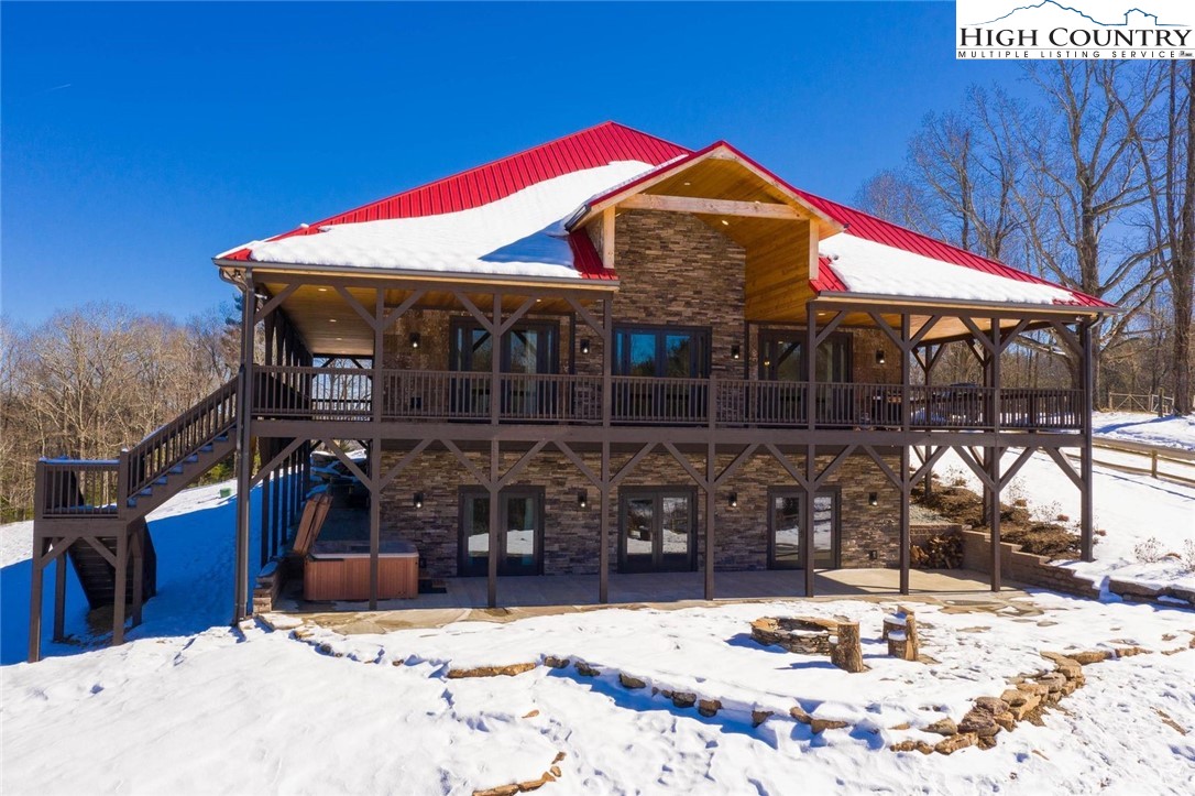 a view of a house with snow