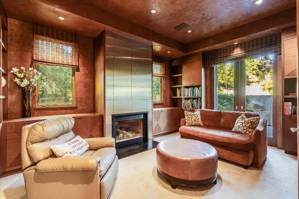 a room with furniture and a flat screen tv