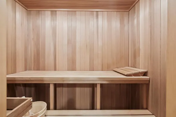 a large white kitchen with a large window