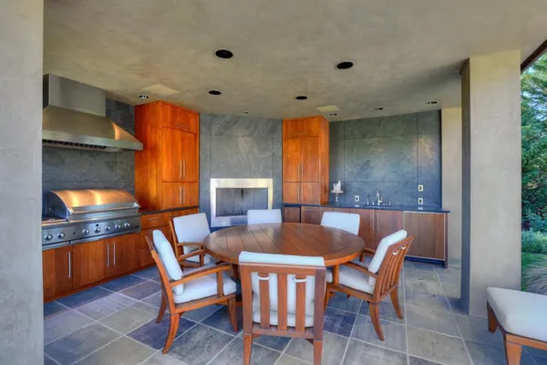 a view of a swimming pool with a lounge chairs