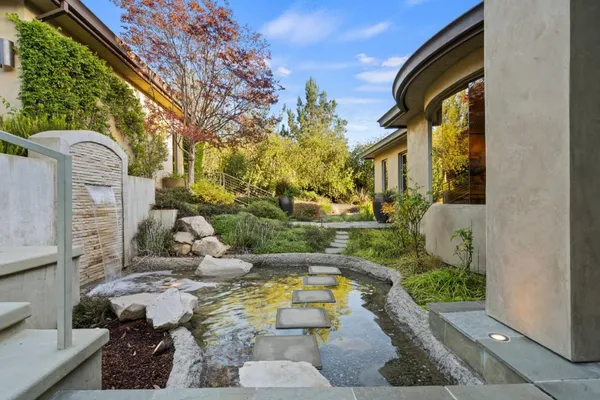 a backyard of a house with lots of green space