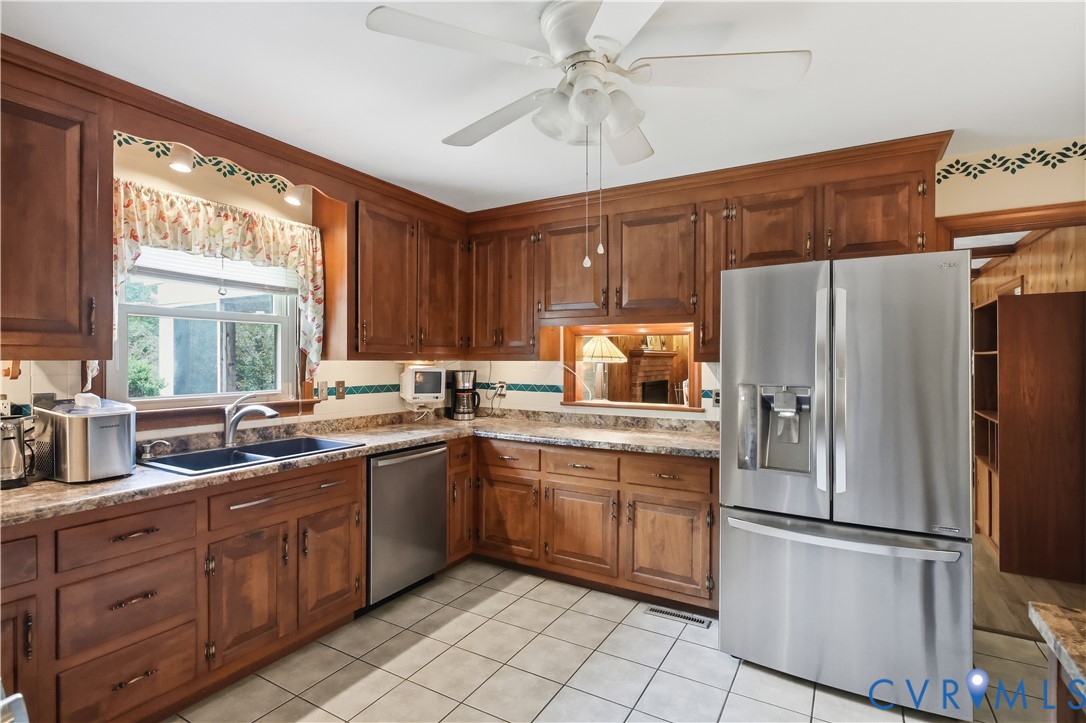 2500 Patricia Road Richmond, VA 23231 - Photo 9 of 34 Kitchen featuring extensive wood cabinetry, white