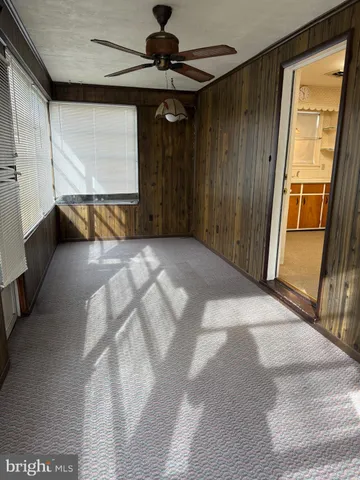 a view of a livingroom with a staircase