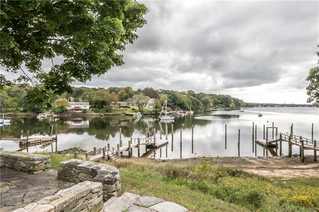 149 Oswegatchie Road Waterford, CT 06385 - Photo 1 of 1 A cloudy day does nothing to dampen the serenity and beauty of Keeny Cove. Your floating dock (Located on the right in this photo) has been recently remodeled, has a electricity and water. This area is considered a Hurricane Hole, meaning that in inclement weather, this is the safest place for your boat(s). With two additional moorings, you'll have plenty of space to keep your beauties! The beach is your personal area. Sit and watch the boats glide by. Peaceful, serene and a feast for your soul!