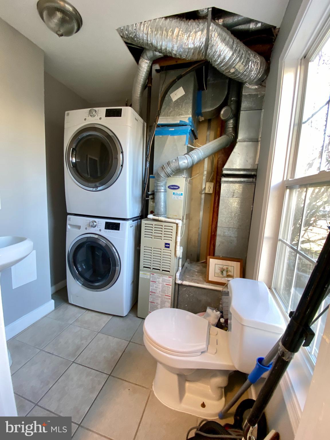 22914 Oakgrove Road Sterling, VA 20166 - Photo 5 of 42 (Main) Laundry & half bath