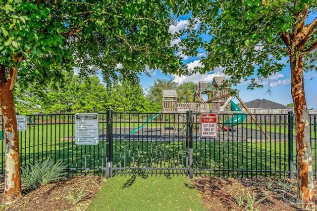 a view of a bird bath and yard