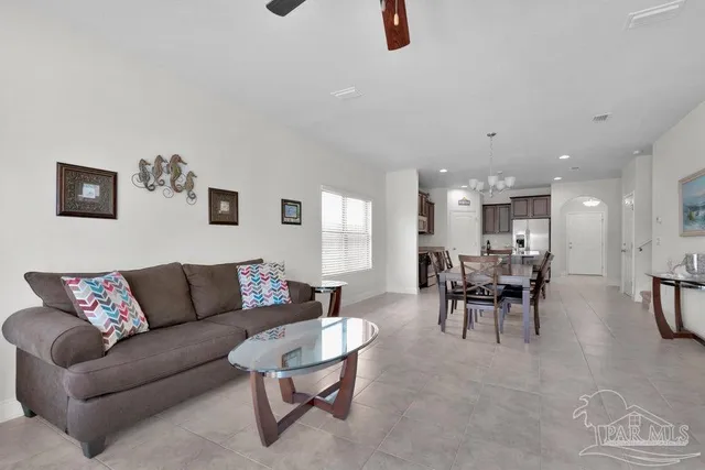 a living room with furniture and a table