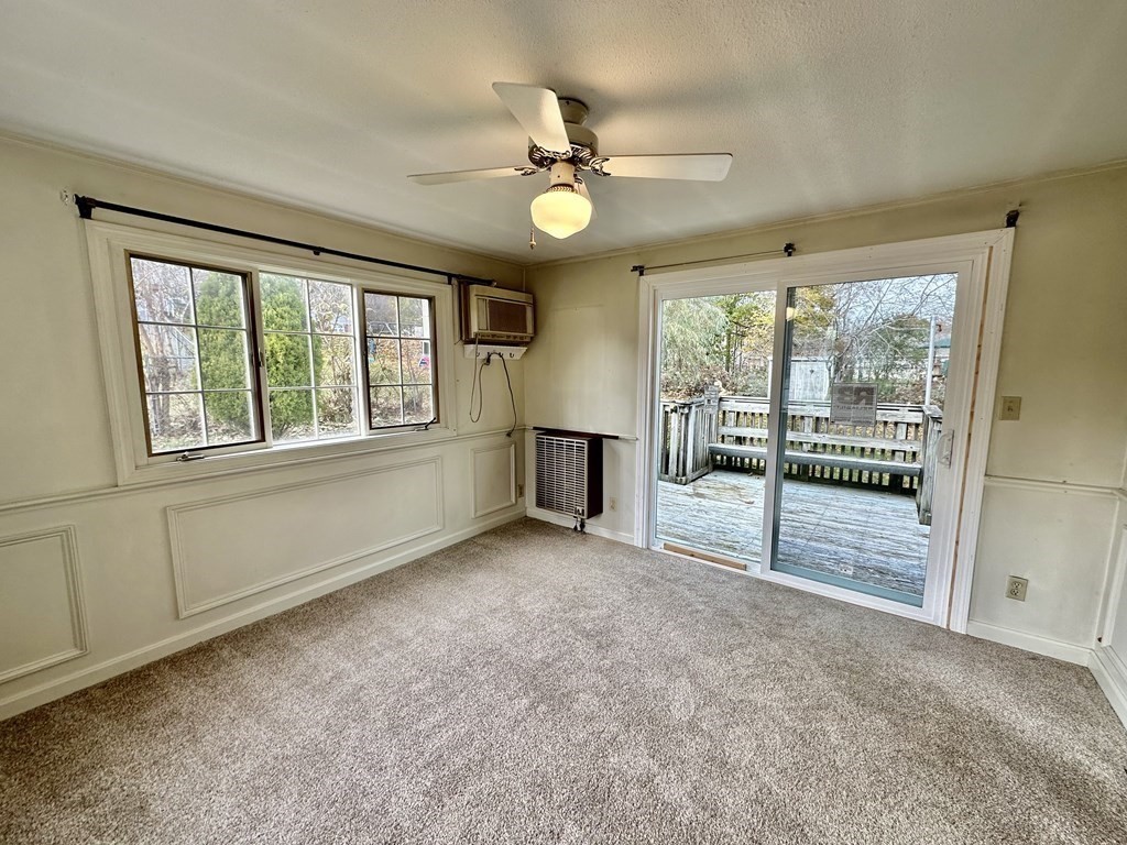 4 Manwell Road Chelmsford, MA 01824 - Photo 7 of 22 an empty room with fan and windows