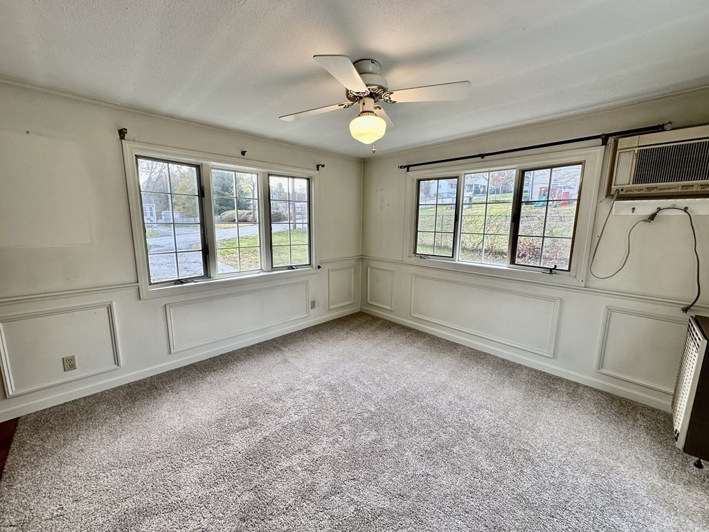 4 Manwell Road Chelmsford, MA 01824 - Photo 8 of 22 a view of an empty room with a window
