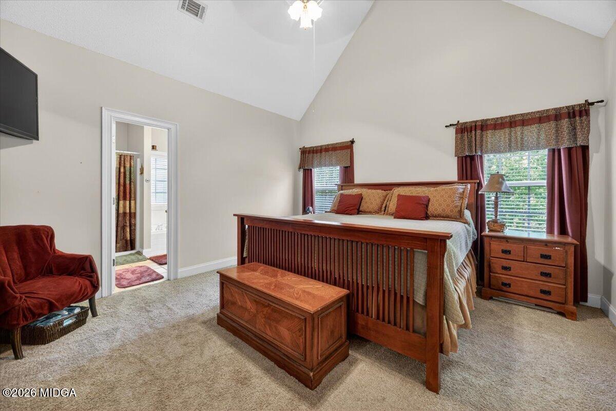 619 Grayridge Road Gray, GA 31032 - Photo 16 of 40 a bedroom with furniture and a window