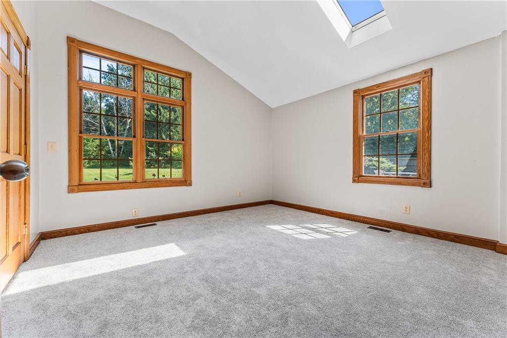 2734 Robertson Road Sharpsville, PA 16150 - Photo 19 of 34 vaulted primary bedroom with large windows