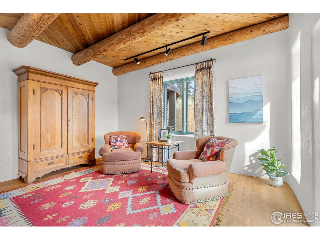 136 Old Post Office Road Boulder, CO 80302 - Photo 26 of 47 Private seating area off the primary bedroom