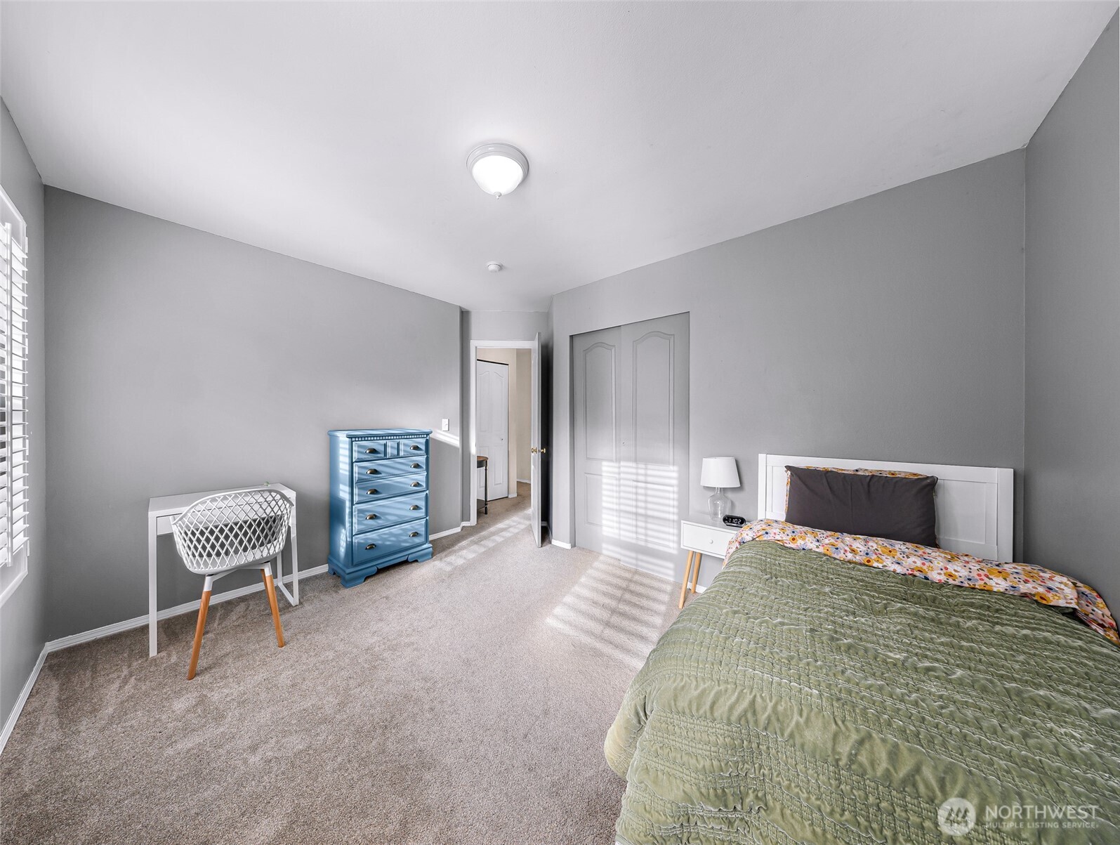 2976 Upland Way Ferndale, WA 98248 - Photo 30 of 38 a bedroom with a bed and a chair