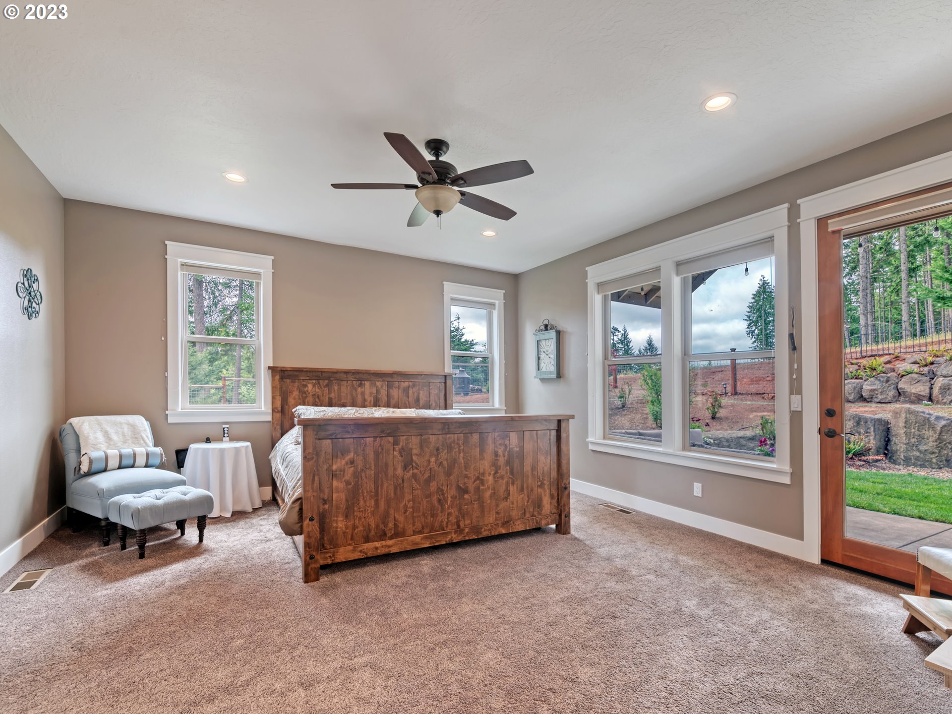 27876 Lady Slipper Loop Eugene, OR 97405 - Photo 13 of 45 a living room with furniture and a large window