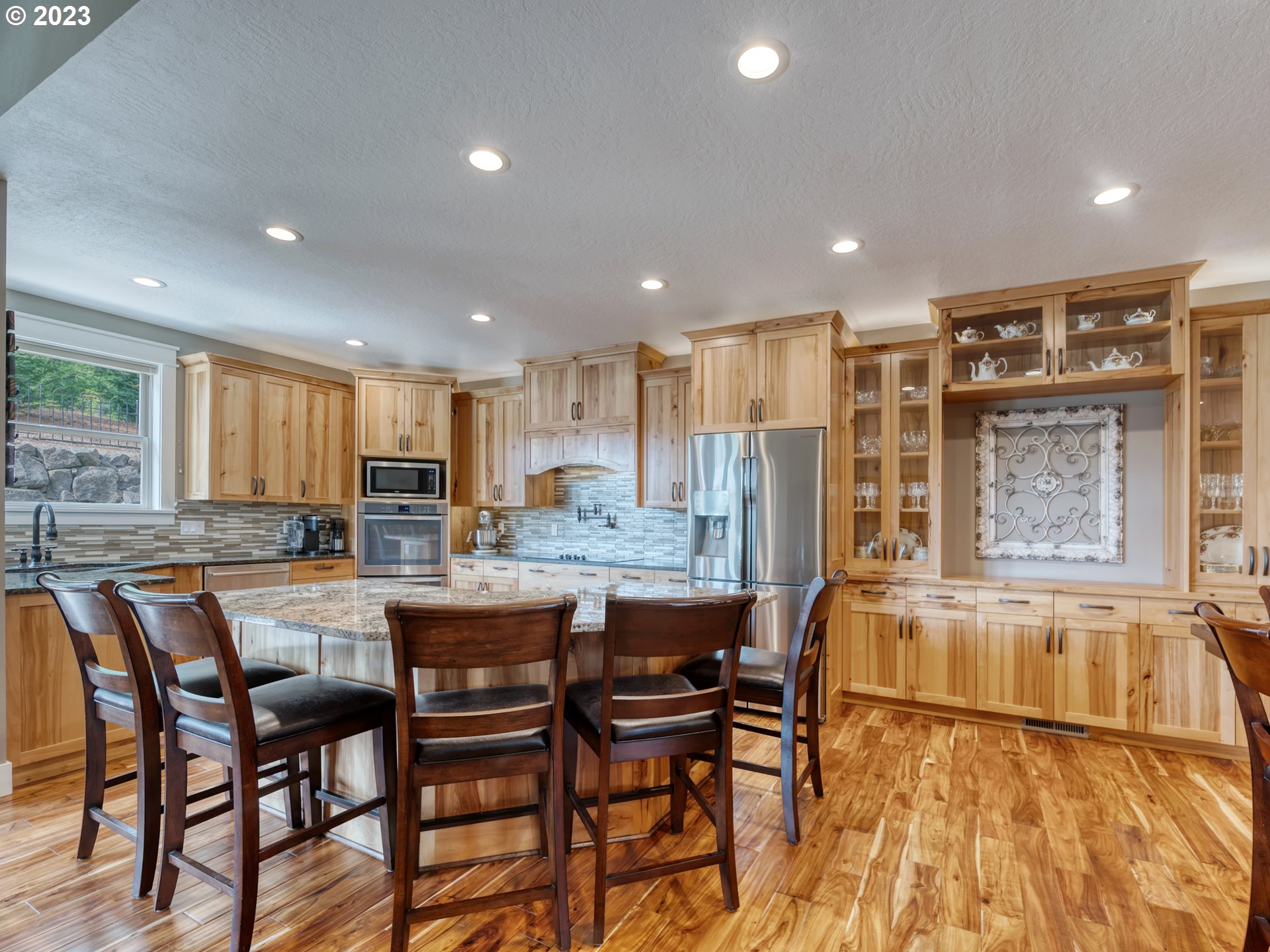 27876 Lady Slipper Loop Eugene, OR 97405 - Photo 17 of 45 a kitchen with a table and chairs in it
