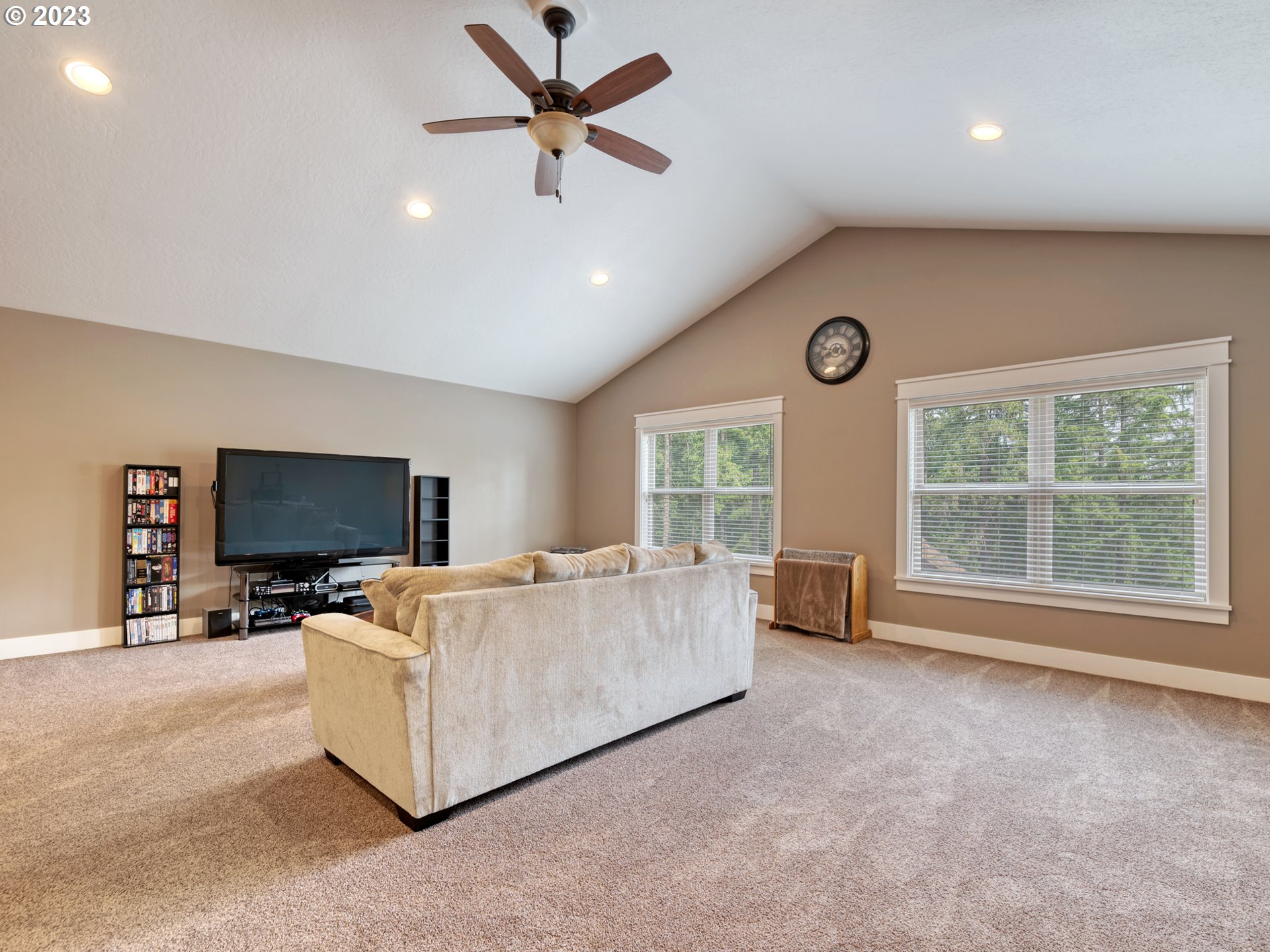 27876 Lady Slipper Loop Eugene, OR 97405 - Photo 22 of 45 a living room with furniture and a flat screen tv