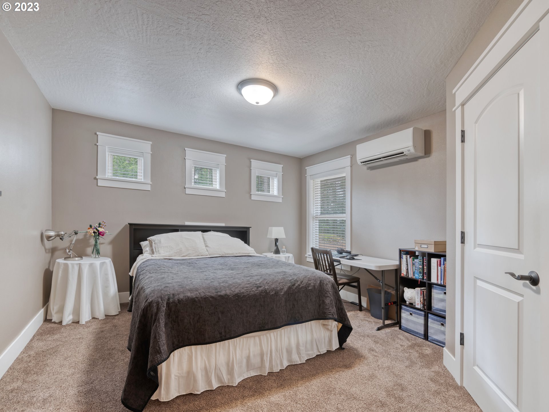 27876 Lady Slipper Loop Eugene, OR 97405 - Photo 25 of 45 a bedroom with a bed and a dresser