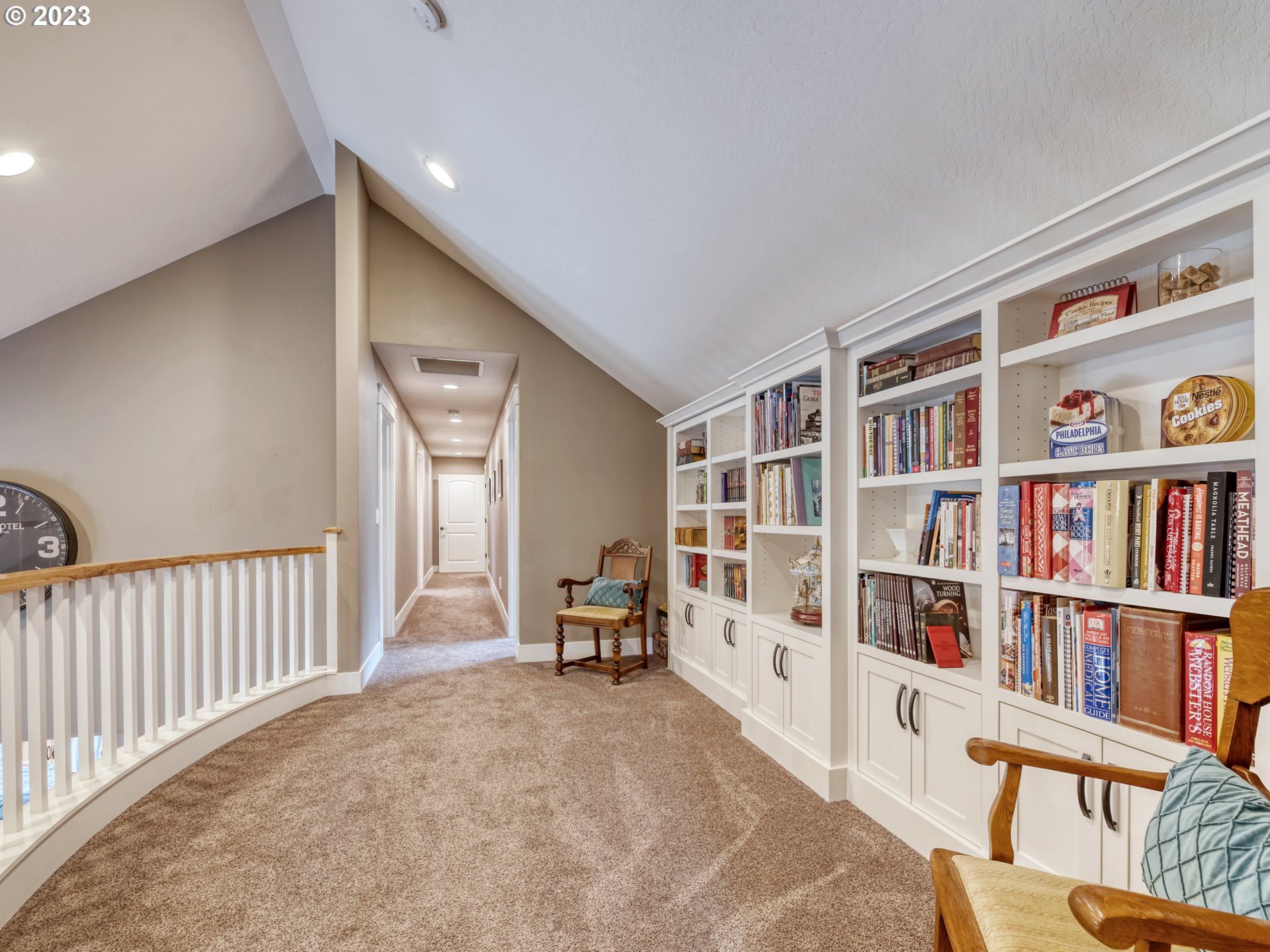27876 Lady Slipper Loop Eugene, OR 97405 - Photo 28 of 45 a living room with furniture and a book shelf