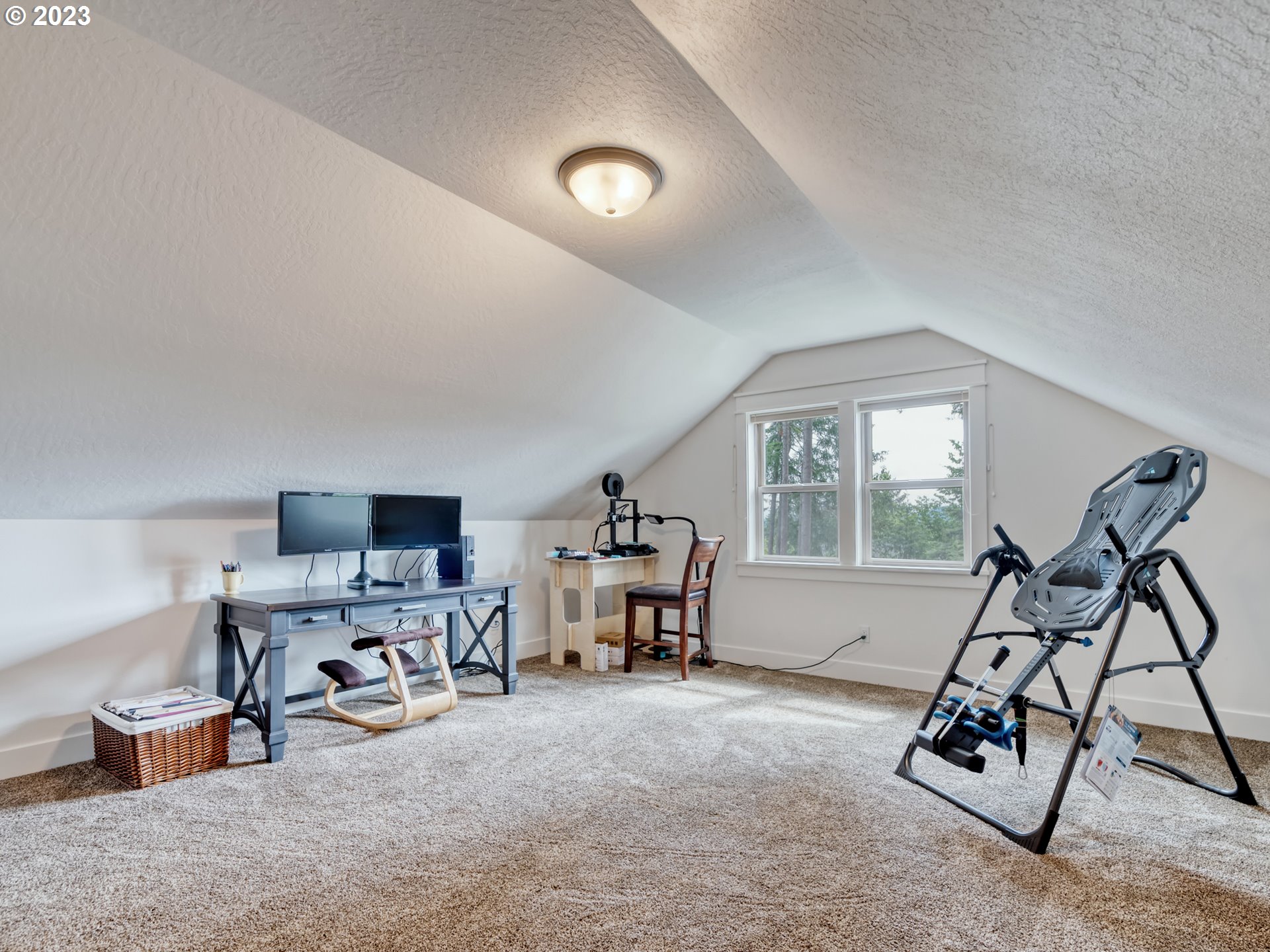 27876 Lady Slipper Loop Eugene, OR 97405 - Photo 29 of 45 a view of a livingroom with workspace and a window