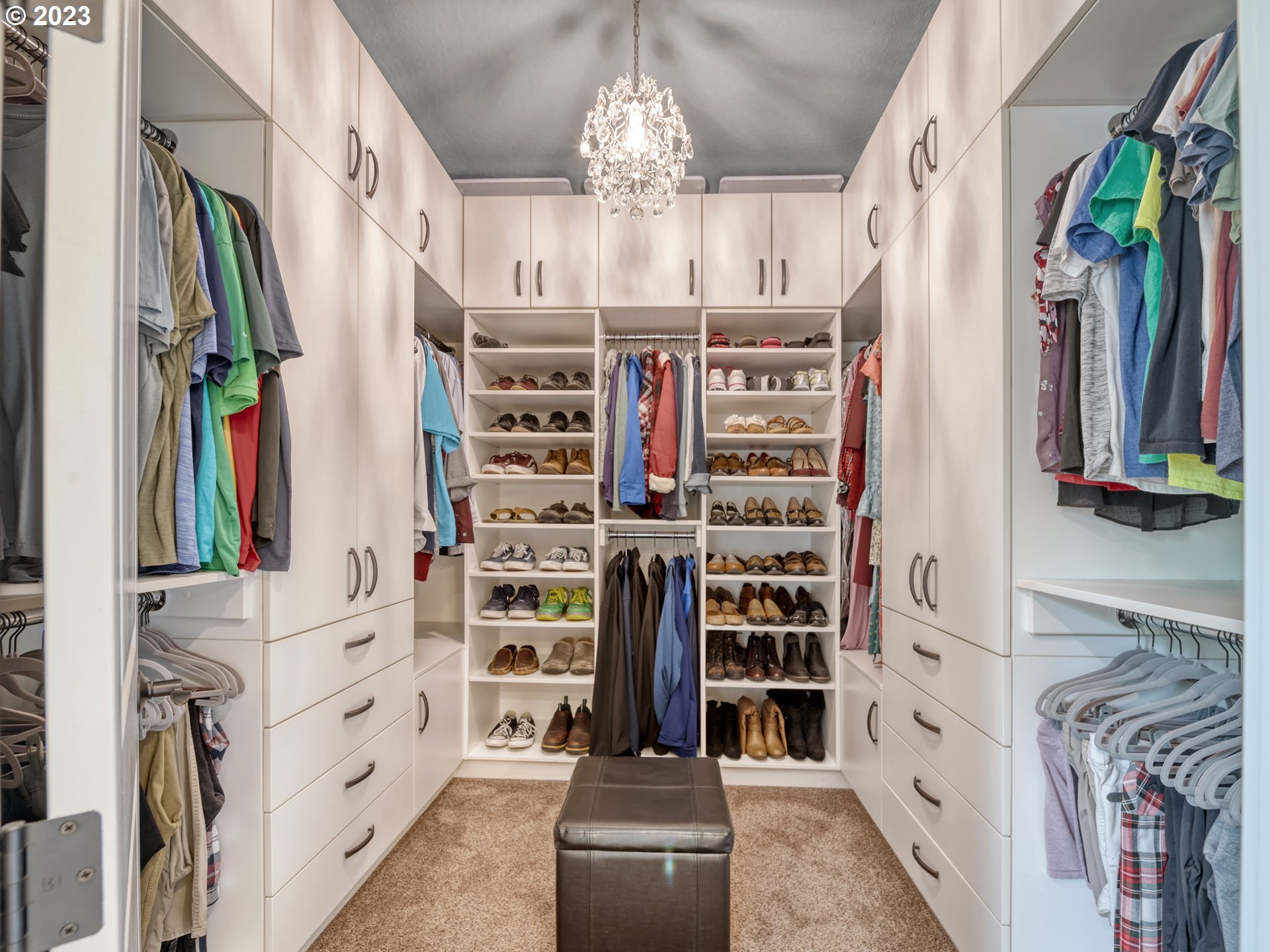 27876 Lady Slipper Loop Eugene, OR 97405 - Photo 35 of 45 a view of walk in closet with clothes and shoes