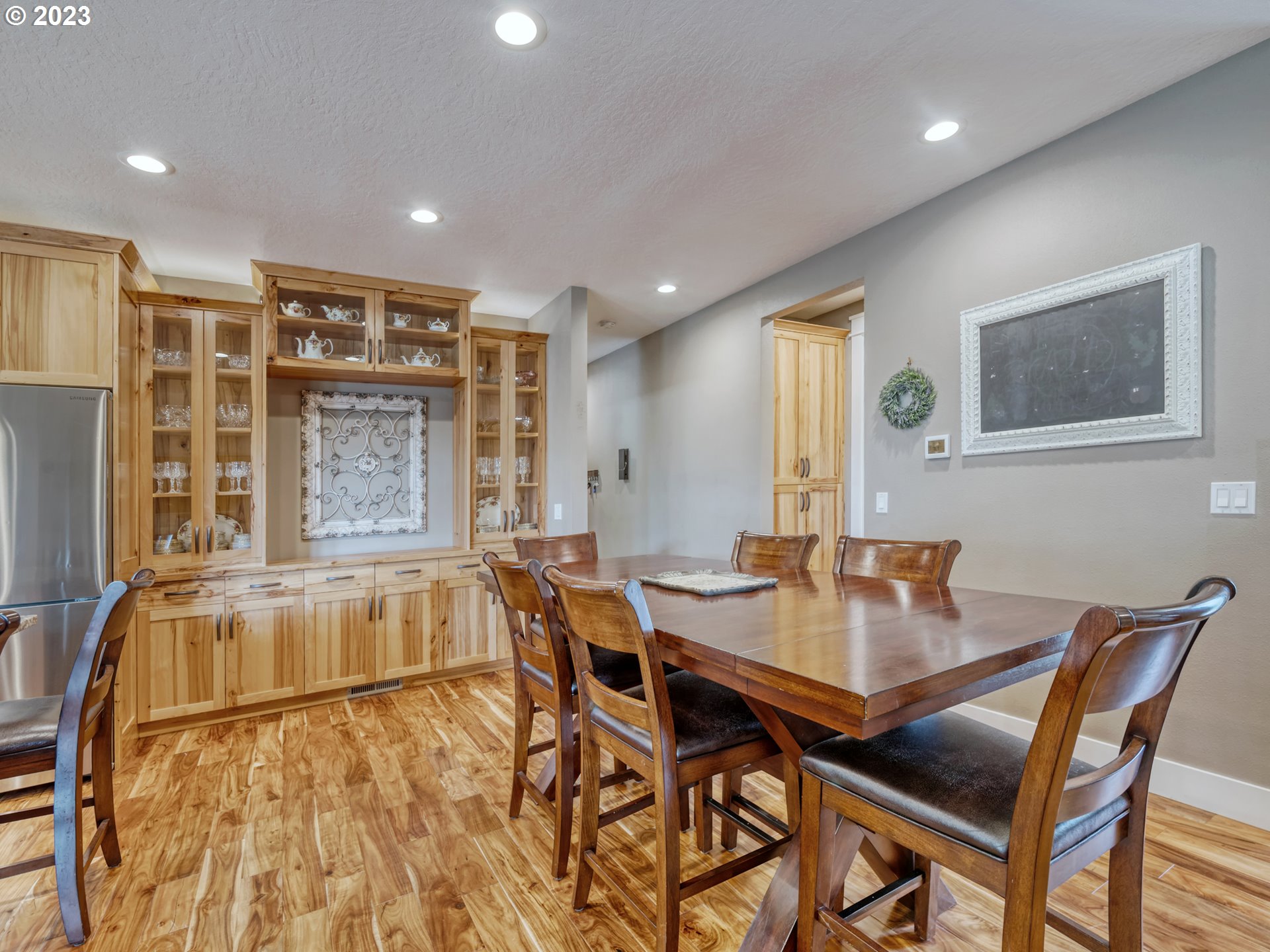 27876 Lady Slipper Loop Eugene, OR 97405 - Photo 36 of 45 a view of a dining room with furniture and chandelier