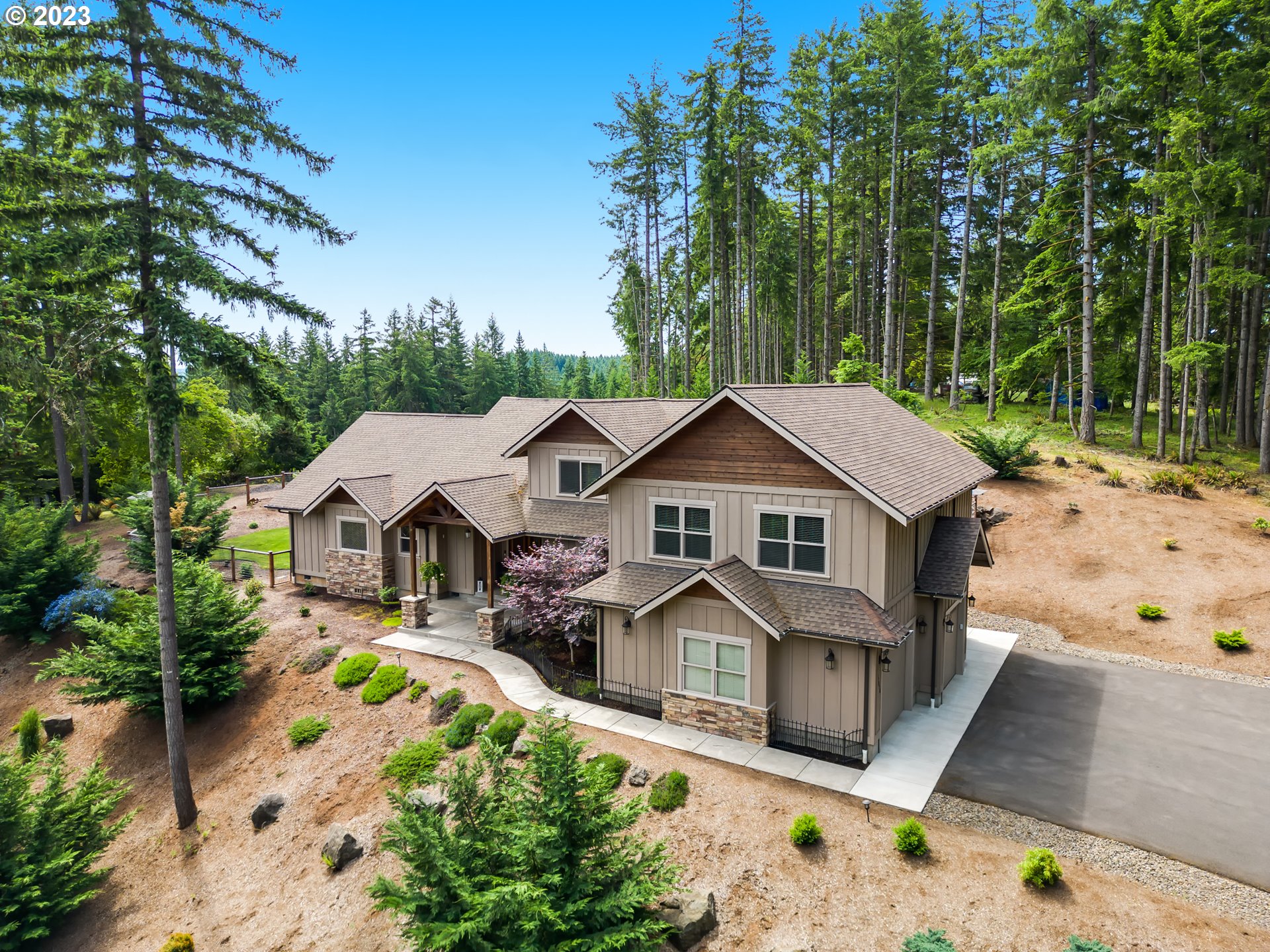 27876 Lady Slipper Loop Eugene, OR 97405 - Photo 4 of 45 an aerial view of a house with swimming pool