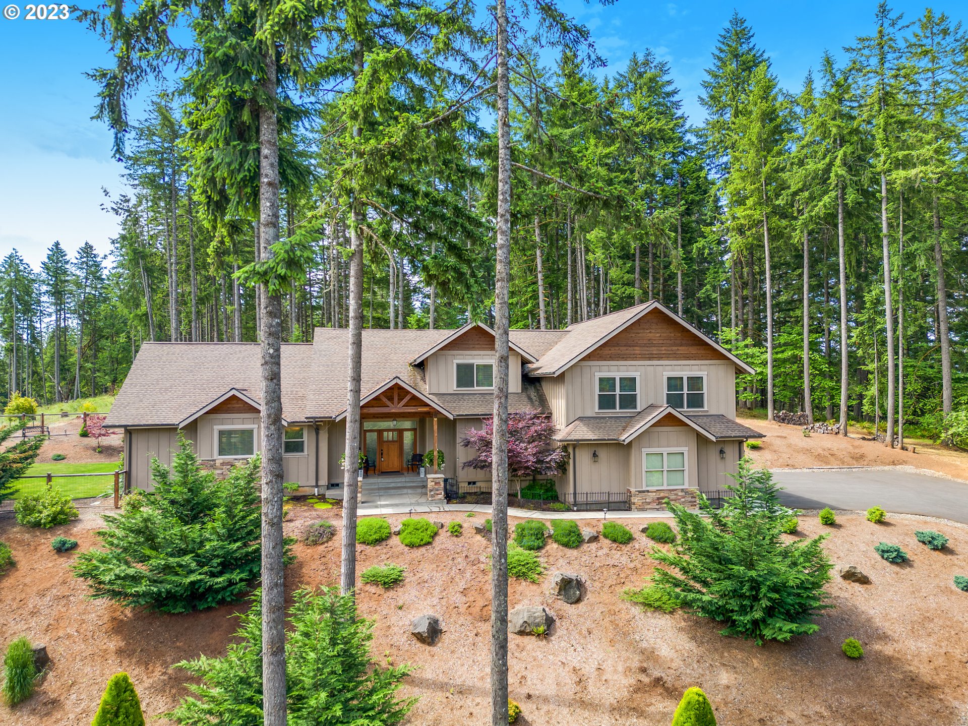 27876 Lady Slipper Loop Eugene, OR 97405 - Photo 6 of 45 a front view of a house with garden