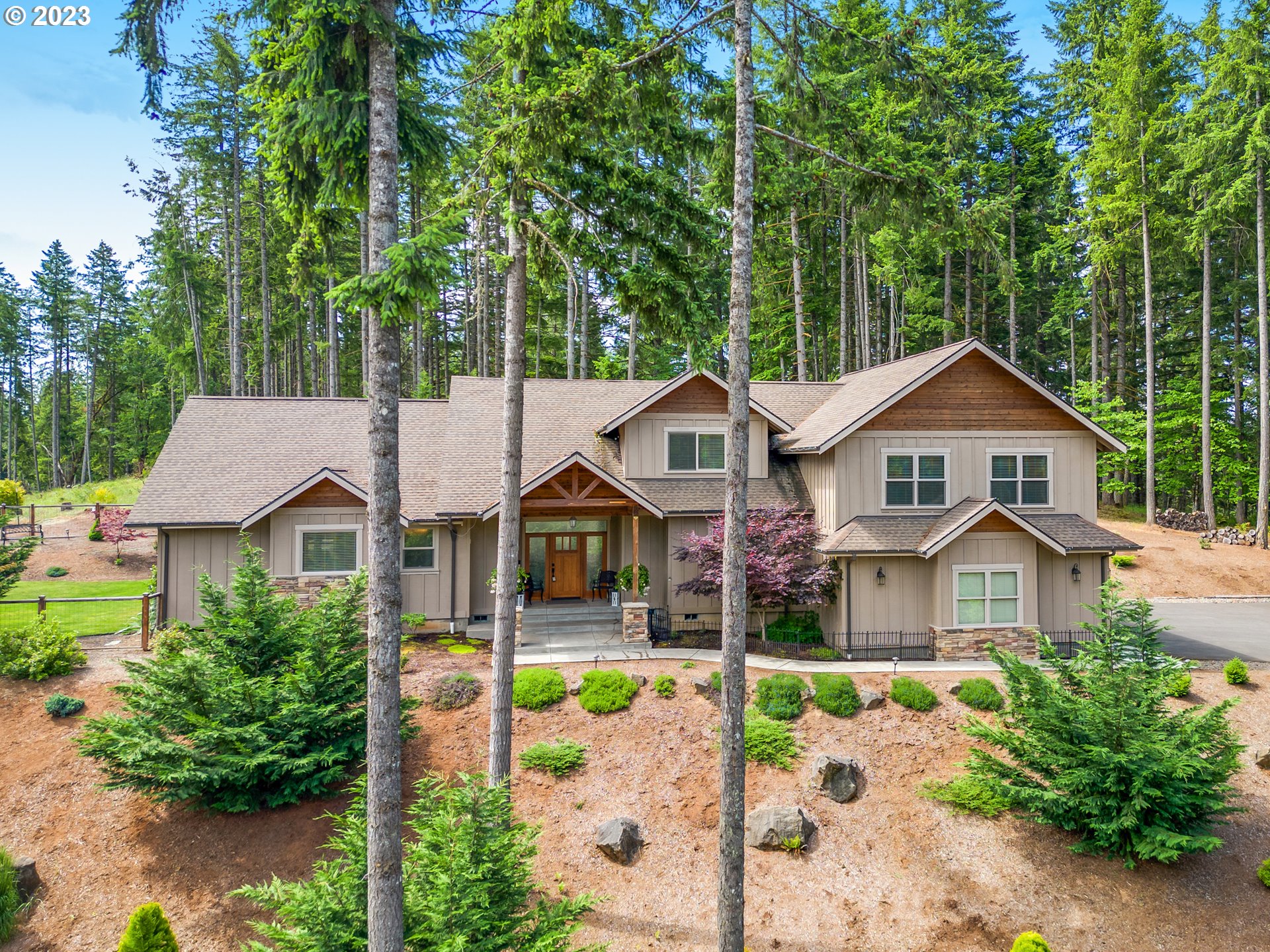 27876 Lady Slipper Loop Eugene, OR 97405 - Photo 7 of 45 a front view of a house with garden
