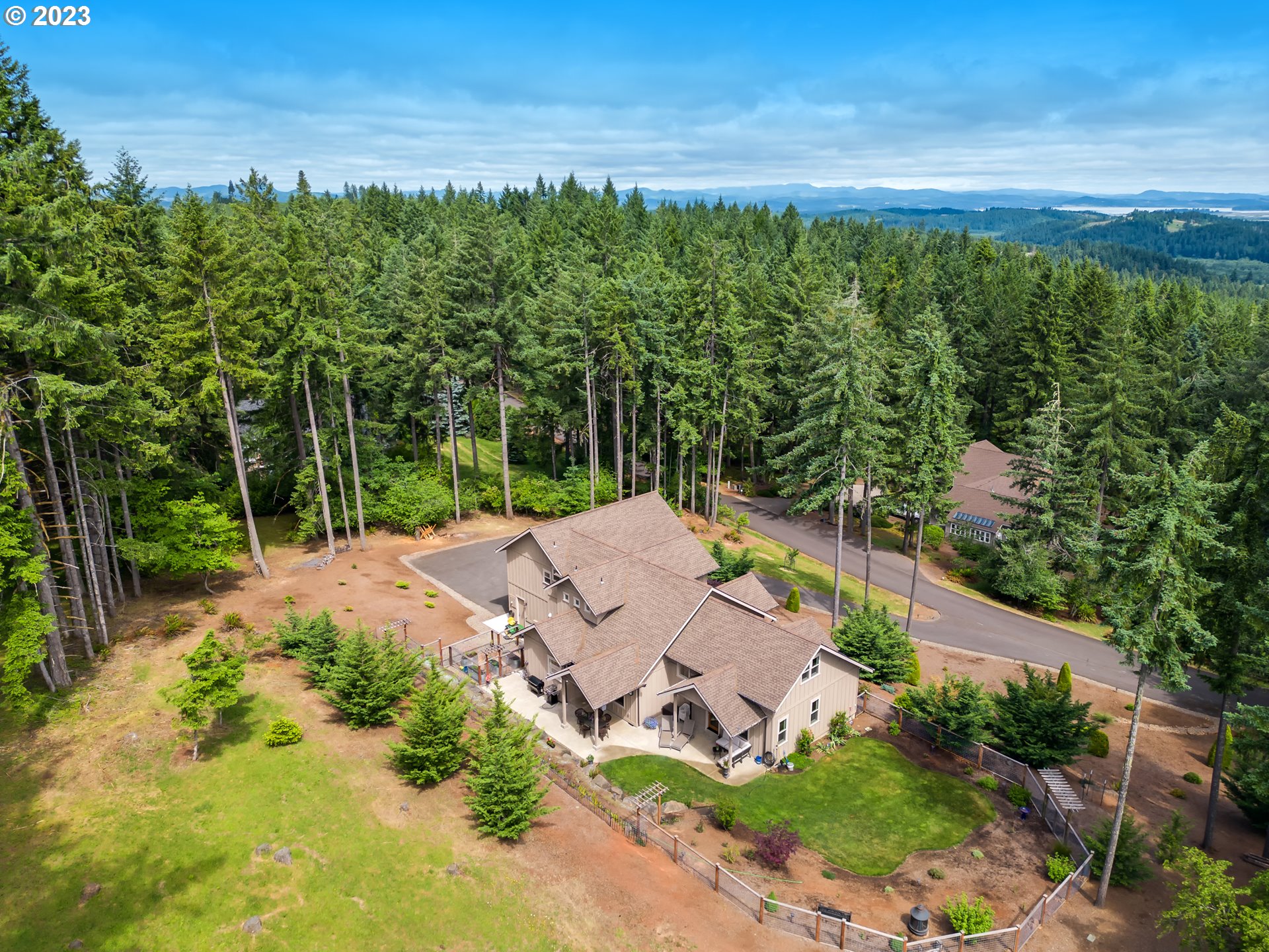 27876 Lady Slipper Loop Eugene, OR 97405 - Photo 10 of 45 a view of a lake with a yard
