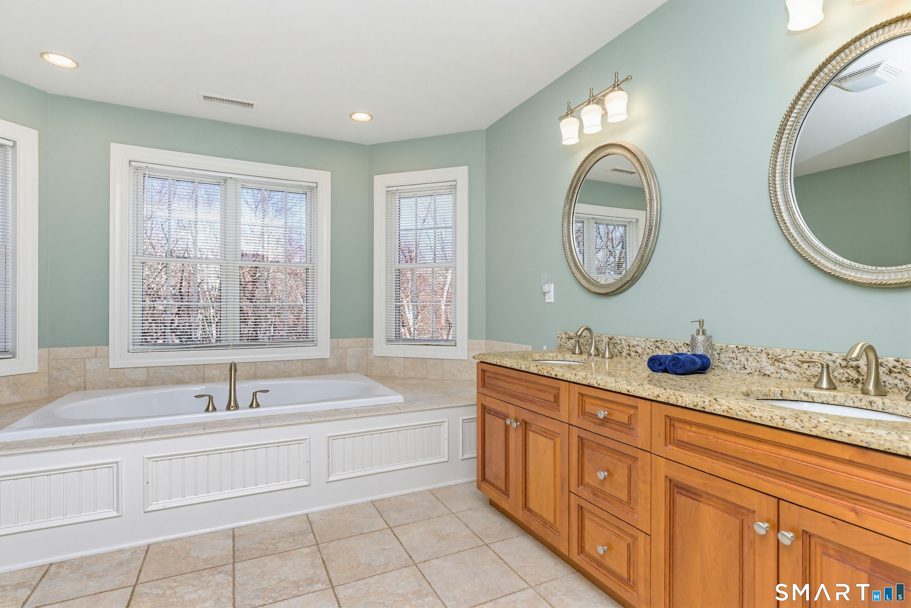 30 Block Farm Road Monroe, CT 06468 - Photo 24 of 40 a bathroom with a sink and a mirror