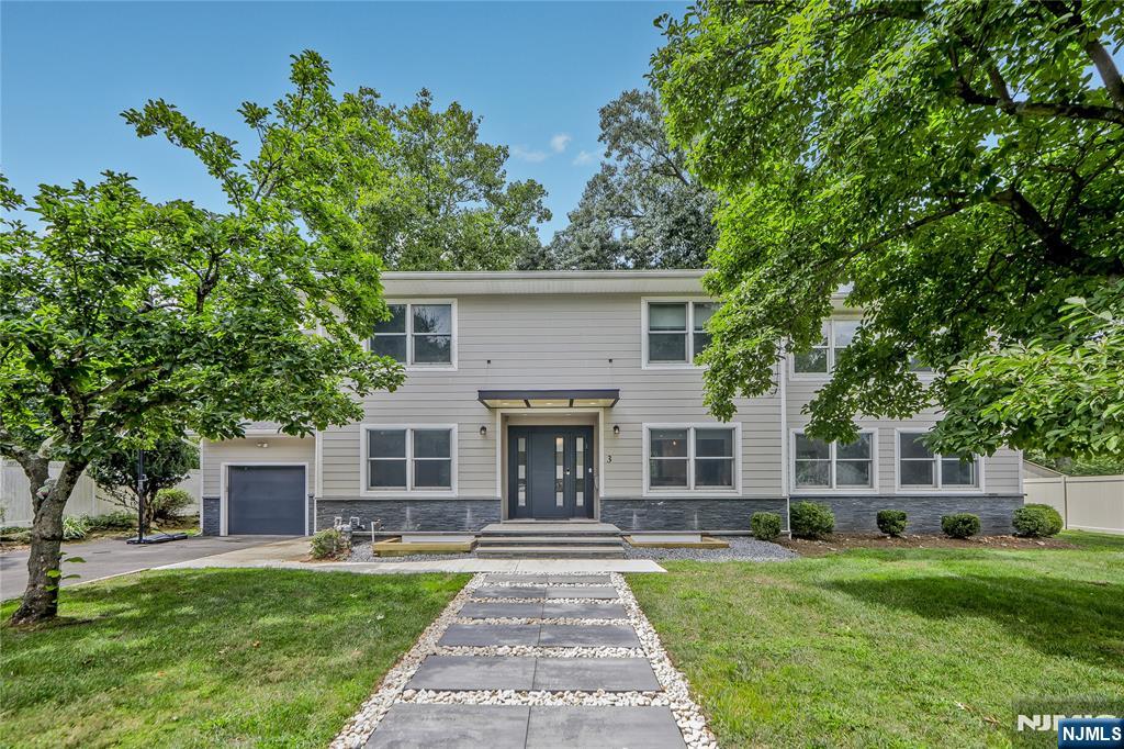 3 Laurel Road Demarest, NJ 07627 - Photo 1 of 43 front view of a house with a garden