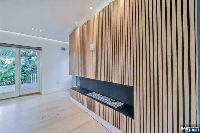 a very nice looking room with wooden floor