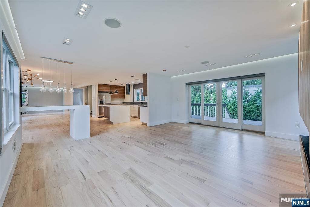 3 Laurel Road Demarest, NJ 07627 - Photo 7 of 43 a view of a living room hardwood floor and a kitchen