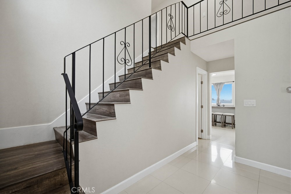2256 Kentwood Drive Riverside, CA 92507 - Photo 12 of 26 a view of entryway and hall with wooden floor