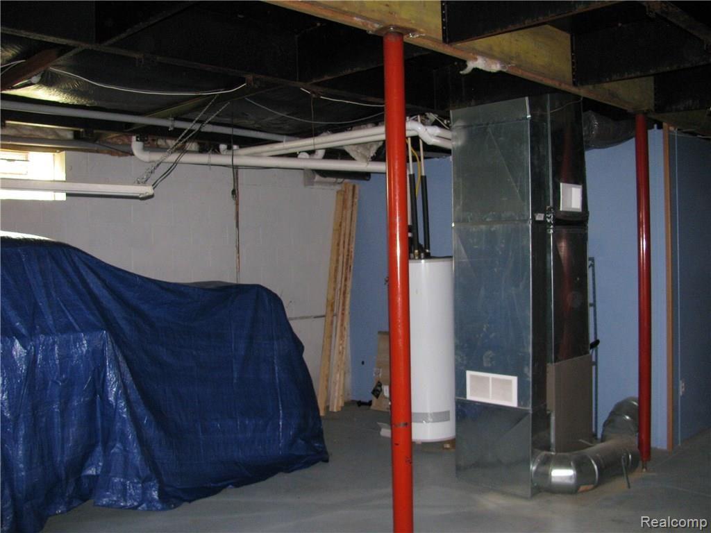 6045 Patrick Road North Branch, MI 48461 - Photo 25 of 44 Unfinished area of basement