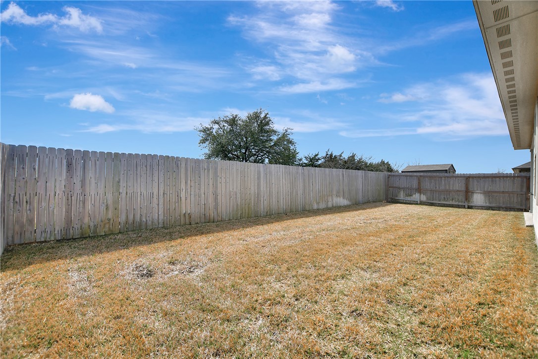 909 Davy Street Brenham, TX 77833 - Photo 31 of 35 View of fenced backyard