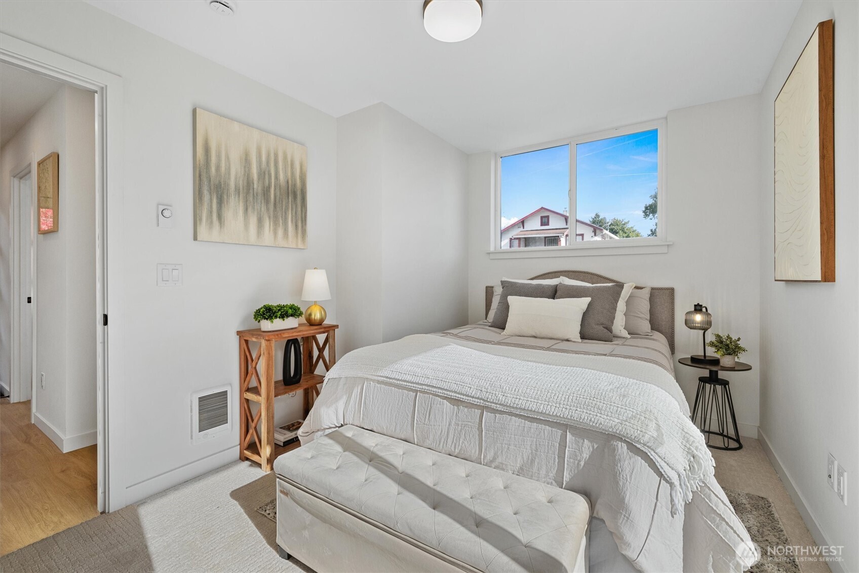 2317 South Judkins Street Seattle, WA 98144 - Photo 13 of 22 a bedroom with a bed and a chair in it