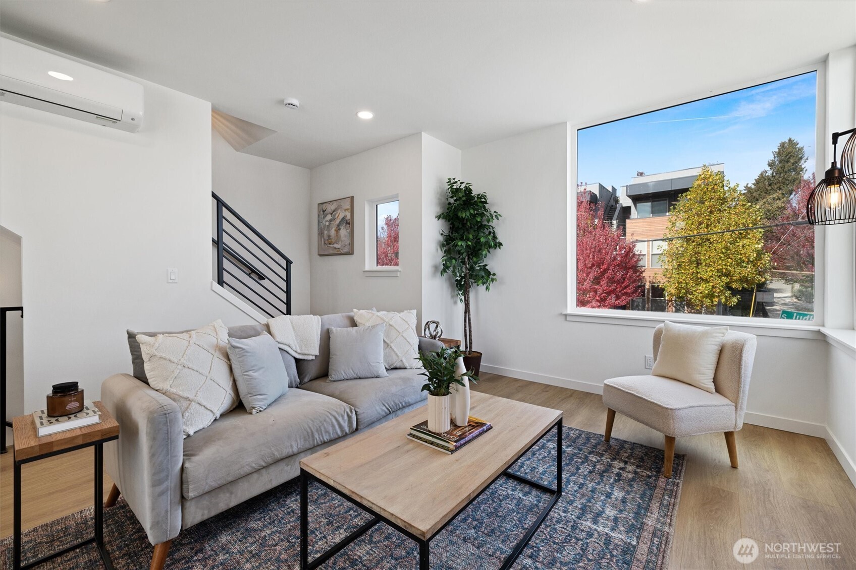 2317 South Judkins Street Seattle, WA 98144 - Photo 9 of 22 a living room with furniture and a potted plant