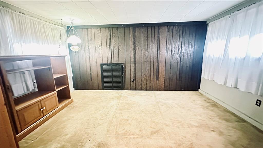 840 Meadow Avenue Monaca, PA 15061 - Photo 16 of 24 a view of an empty room with wooden door