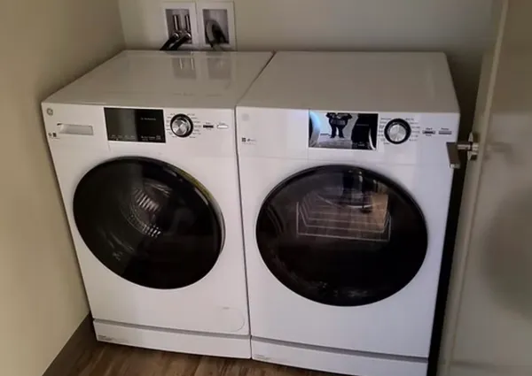 a utility room with dryer and washer
