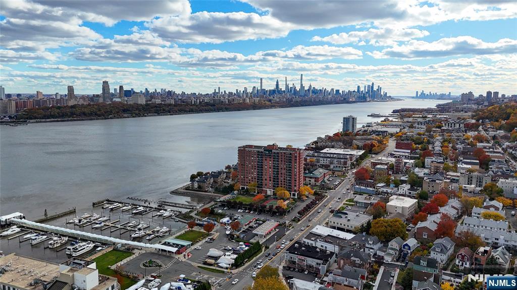 905 River Road, Unit 312 Edgewater, NJ 07020 - Photo 27 of 33 a view of a city and lake