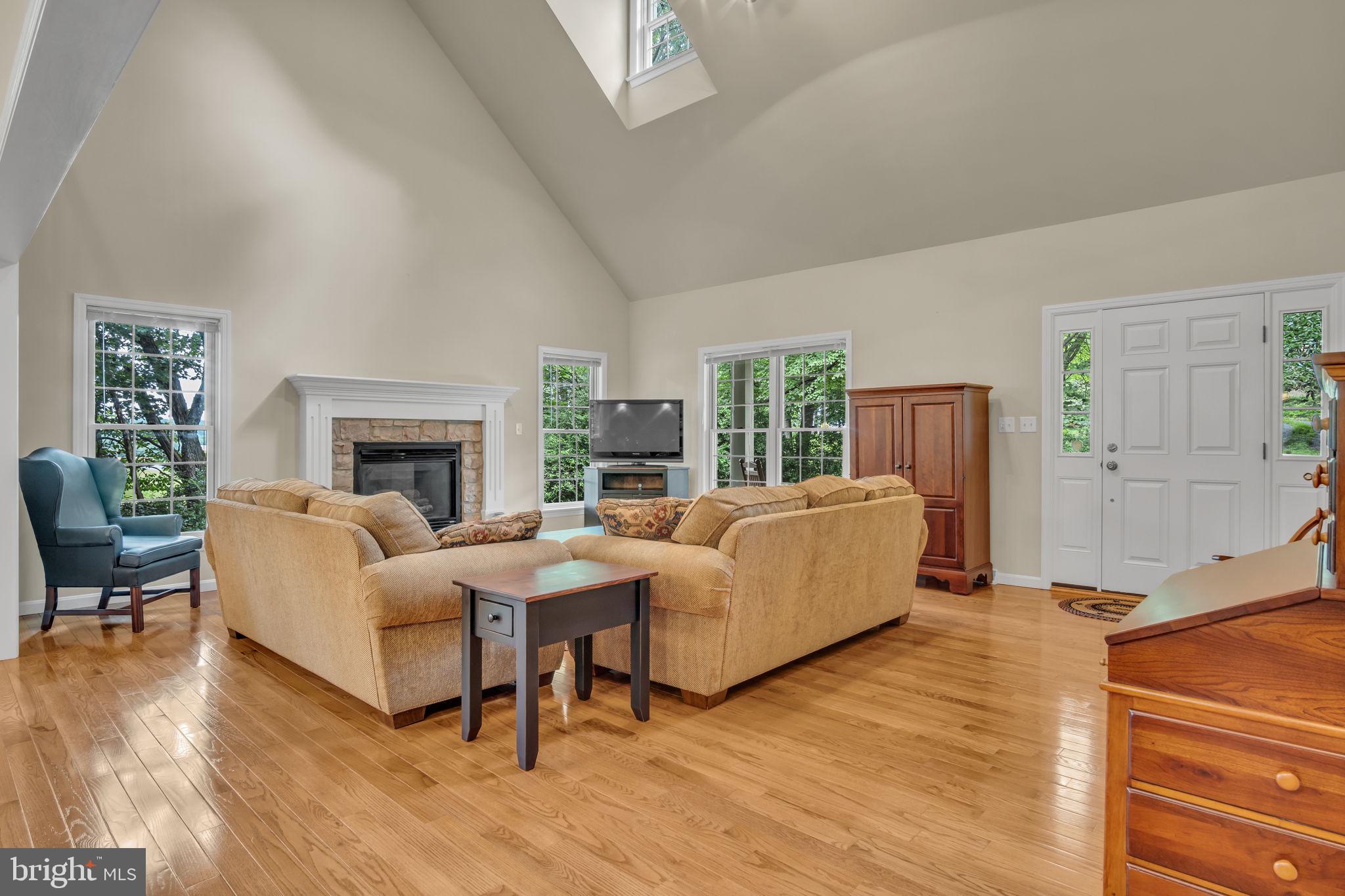 362 Aberdeen Road Elizabethtown, PA 17022 - Photo 4 of 67 a living room with furniture large window and a fireplace