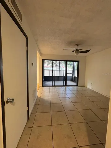 a view of a bathroom from a hallway