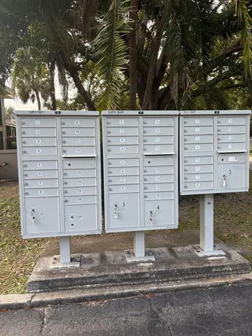 a view of a house with a fence