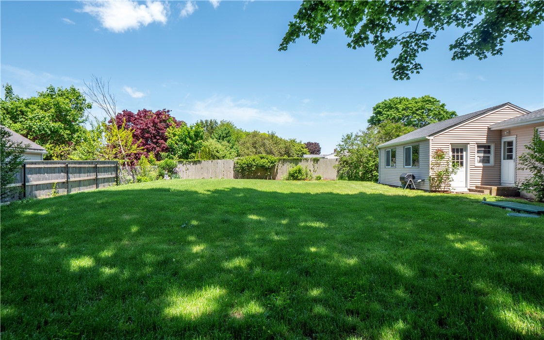52 Stage Coach Road Portsmouth, RI 02871 - Photo 38 of 47 Large yard with roses, blueberry, blackberry and raspberry bushes.