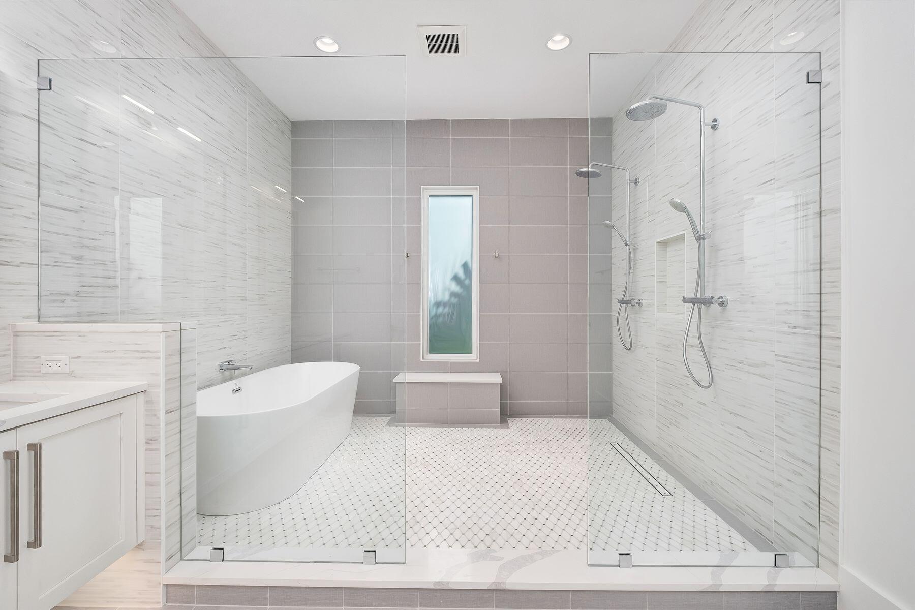 56 Pelican Glide Lane Seacrest, FL 32461 - Photo 19 of 55 a bathroom with a bathtub a toilet a sink and shower