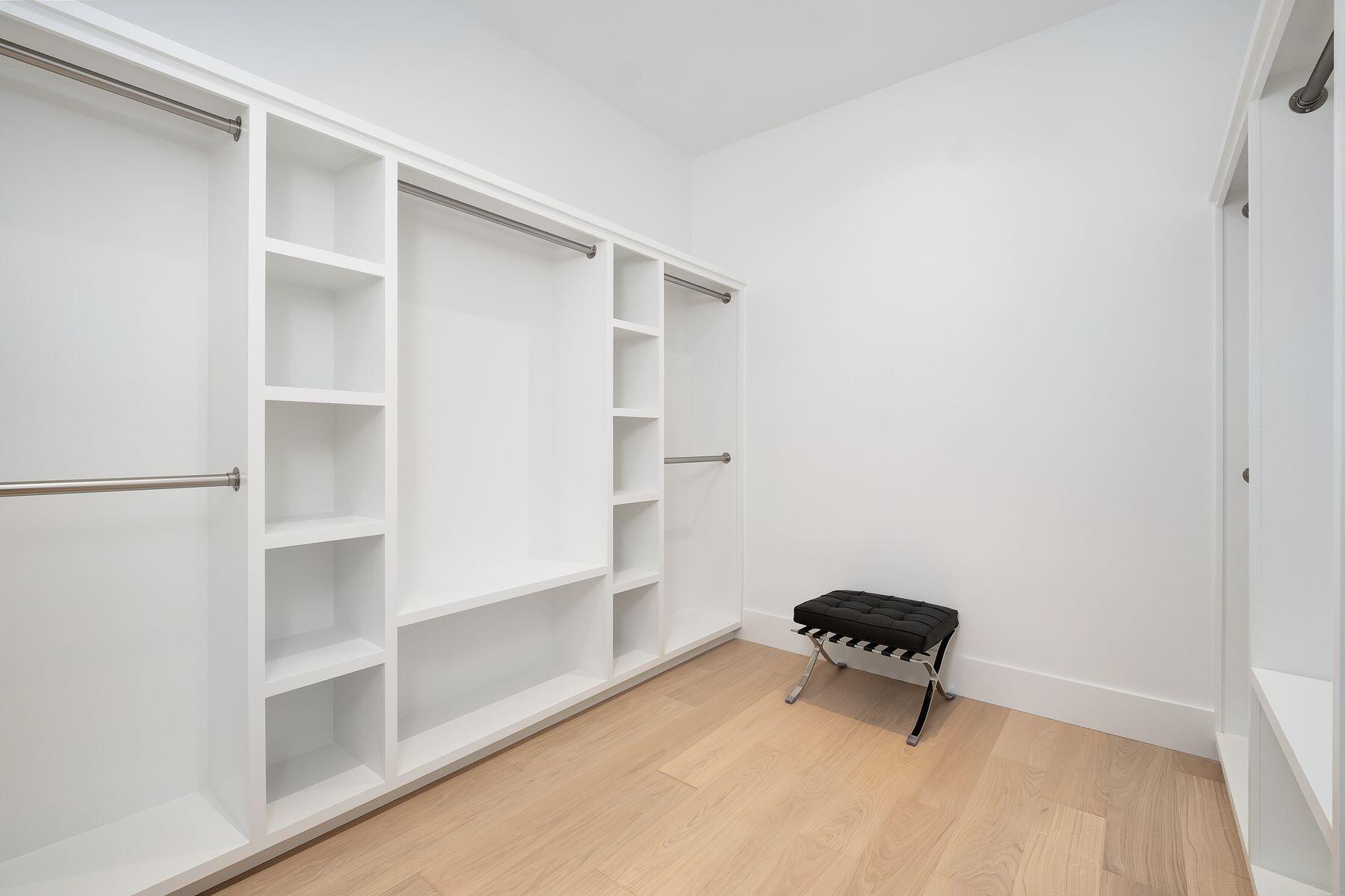 56 Pelican Glide Lane Seacrest, FL 32461 - Photo 21 of 55 a room with a bench and a window