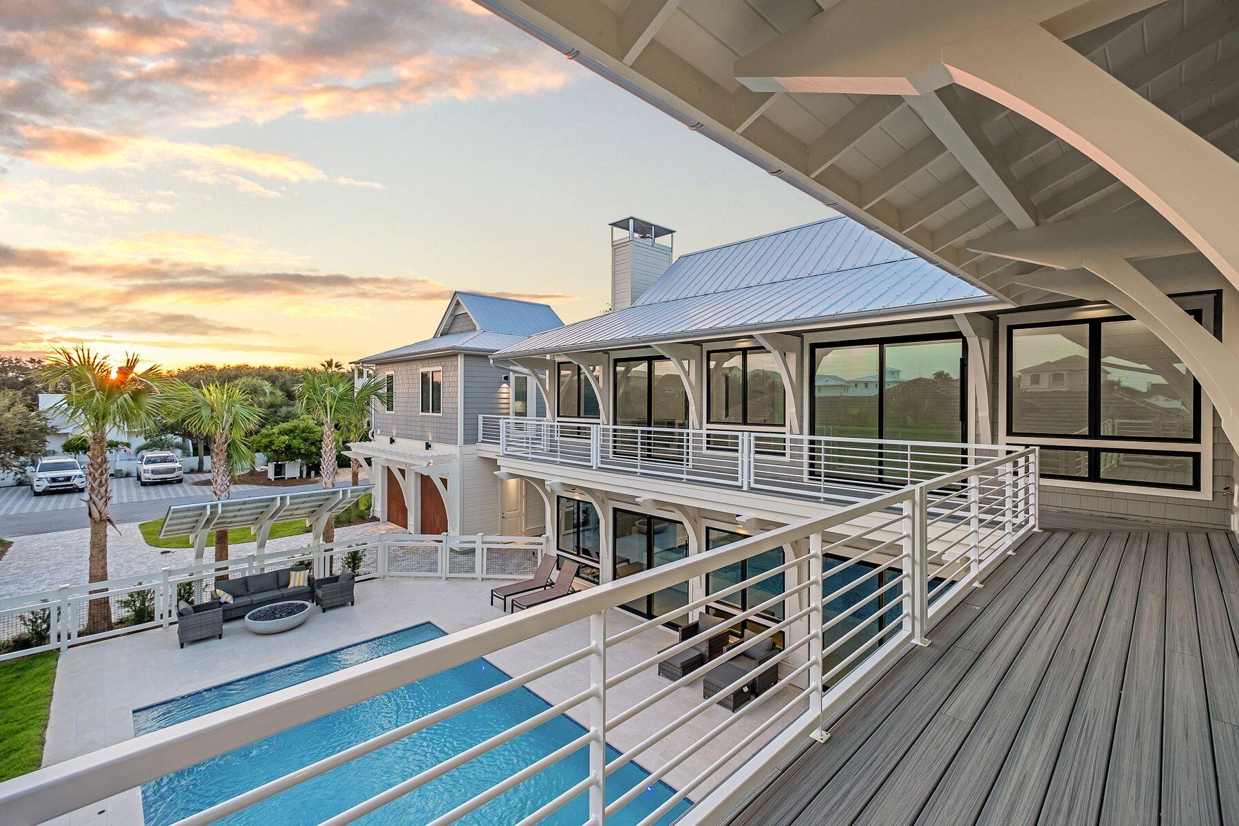 56 Pelican Glide Lane Seacrest, FL 32461 - Photo 23 of 55 a view of a balcony with chairs