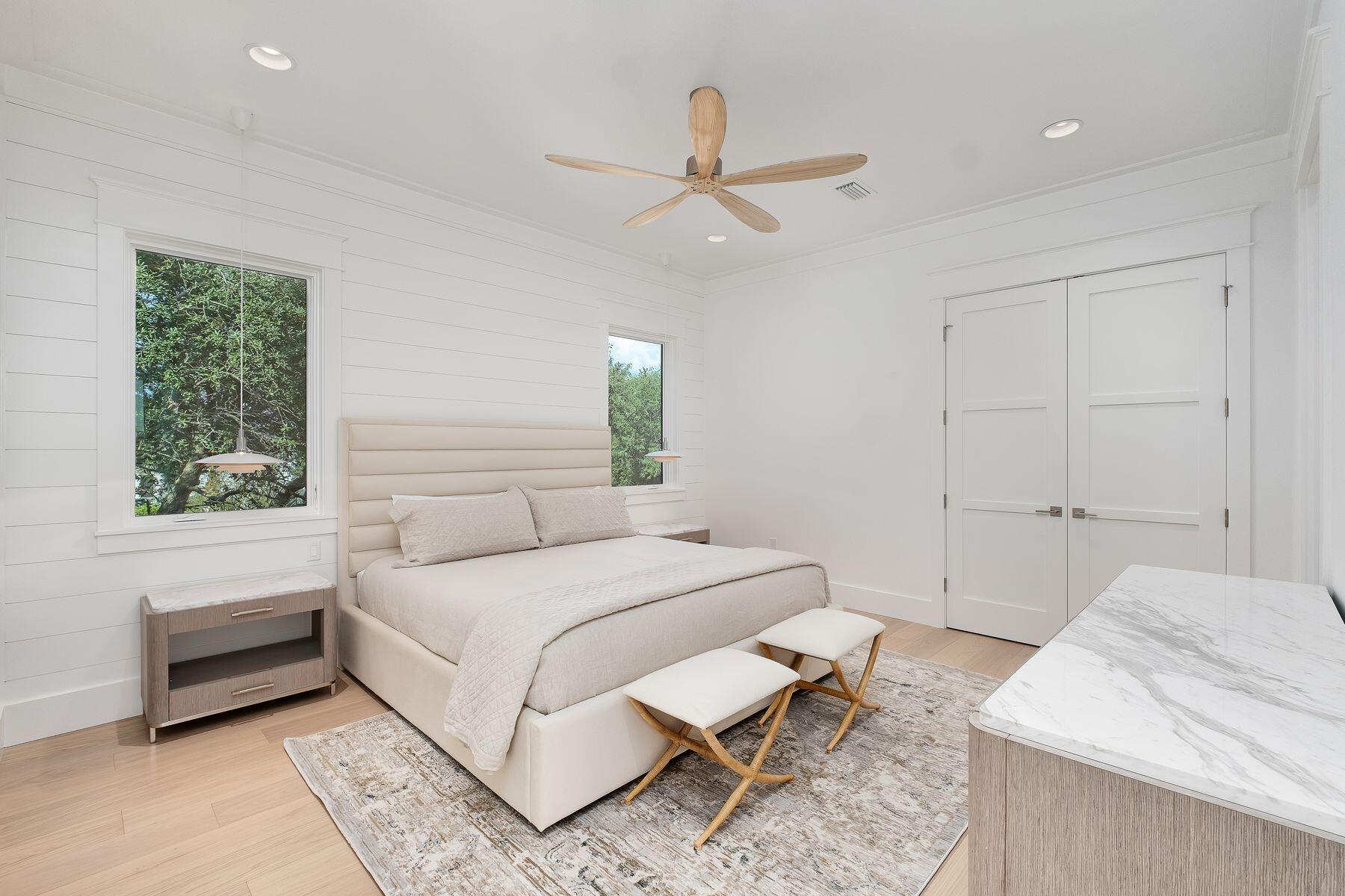 56 Pelican Glide Lane Seacrest, FL 32461 - Photo 31 of 55 a bedroom with a bed and a window